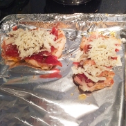 Topped with cheese and ham, ready for the oven